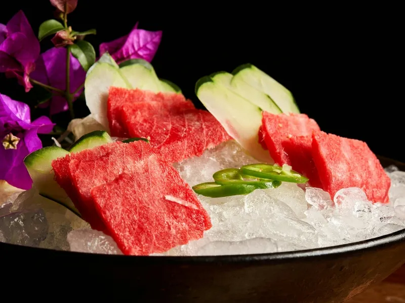 Chilled tuna sashimi with cucumber and jalapeño on ice at Mici Asian Bistro，a Asian Fusion Restaurant in Trumbull